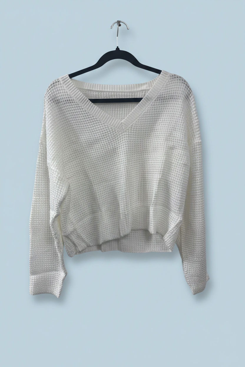 White V-Neck Sweater - Light Blue Background